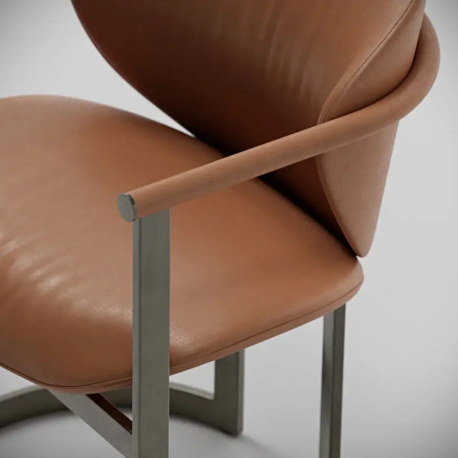 Distinctive Capital Flora armchair with enveloping curves, reddish-brown polyurethane composite upholstery and galvanic aluminum structure