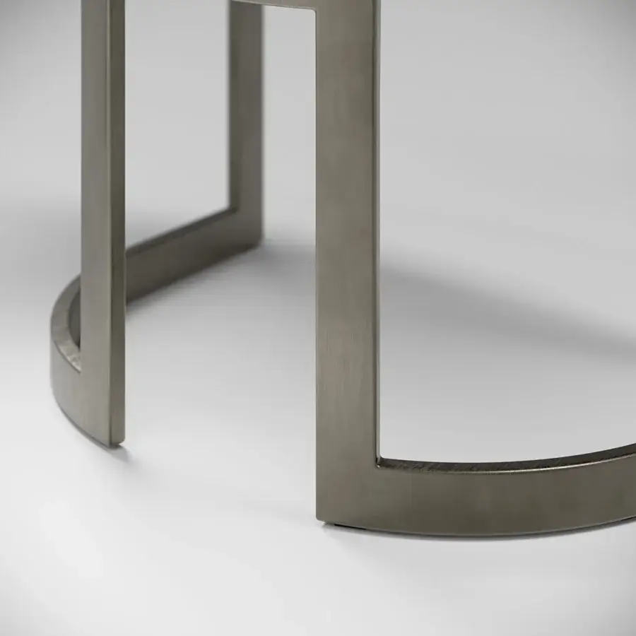 Distinguished Capital Flora armchair with curved form, galvanic aluminum base and polyurethane composite upholstery in a muted gray tone