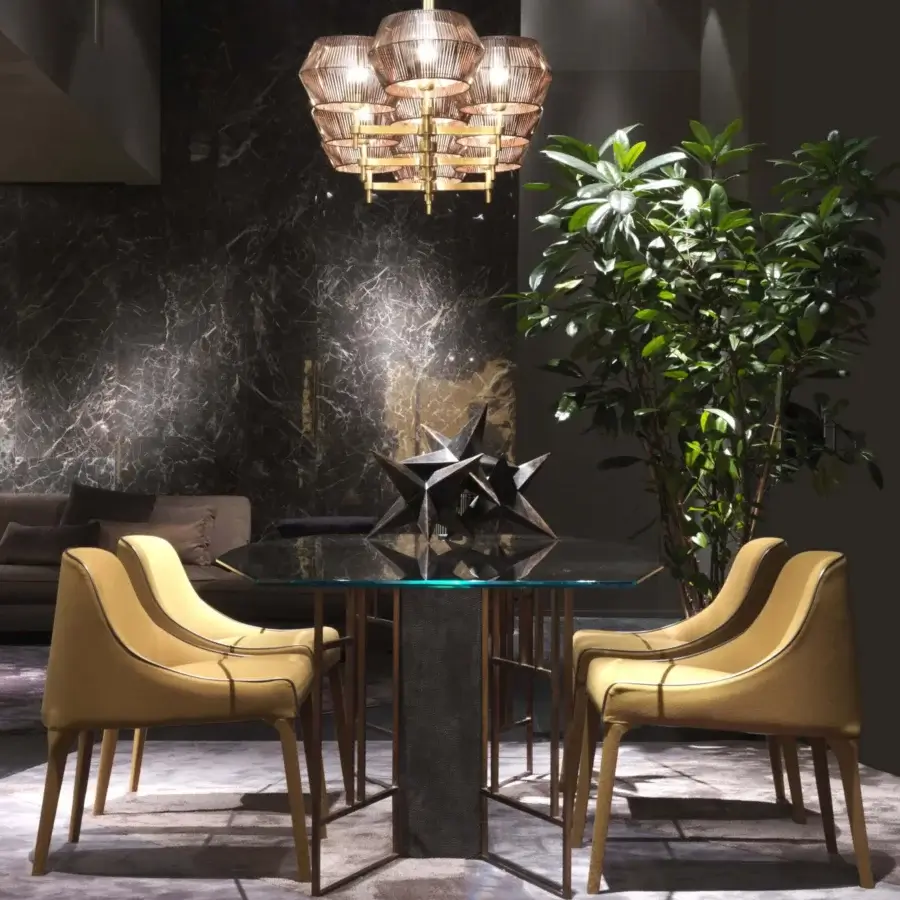 Distinguished Patrizia Garganti Novecento lamp crafted in metal with warm gold satin finish and sculptural cage silhouette