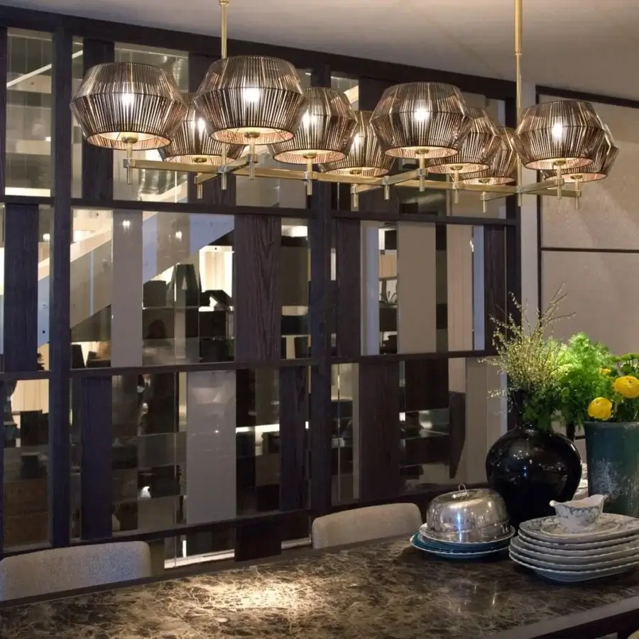 Distinguished Patrizia Garganti Novecento lamp with a dark metal frame, golden accents and translucent ribbed shades