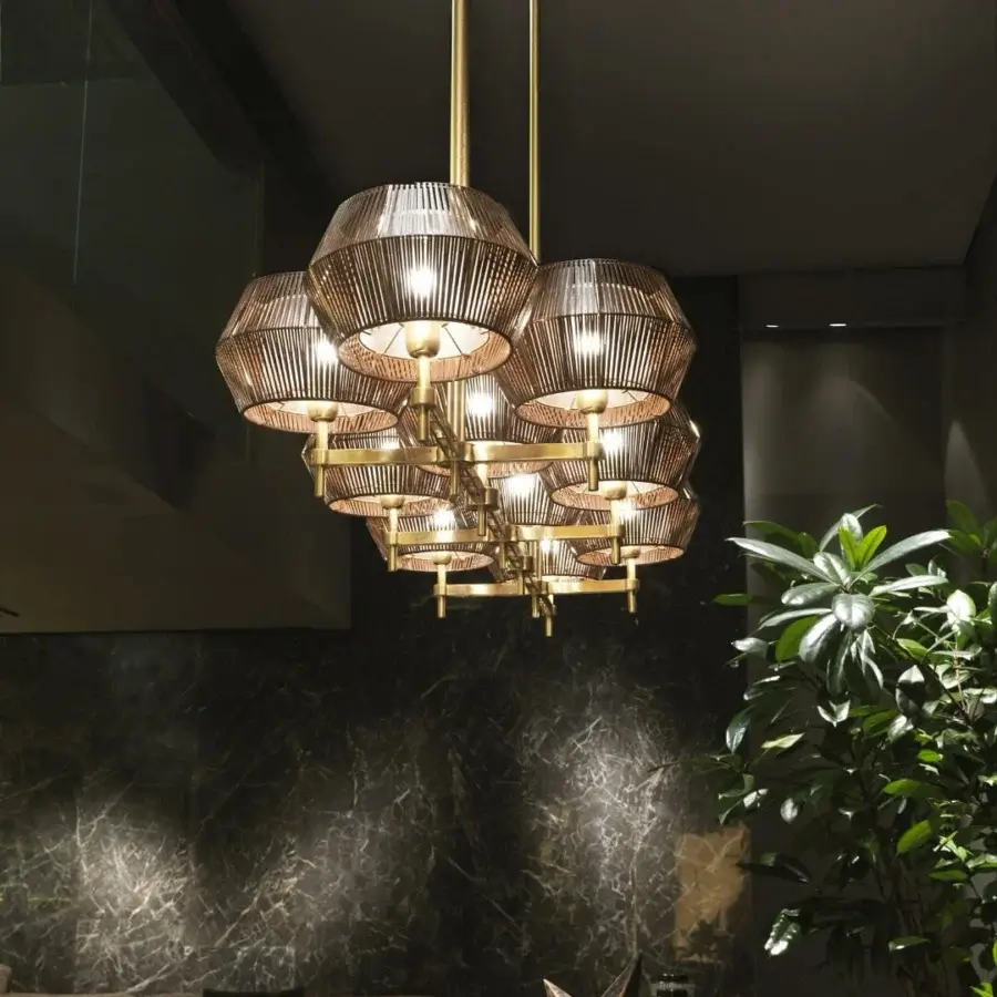 Superior Patrizia Garganti Novecento lamp crafted in golden brass-toned metal with translucent shades diffusing elegant light