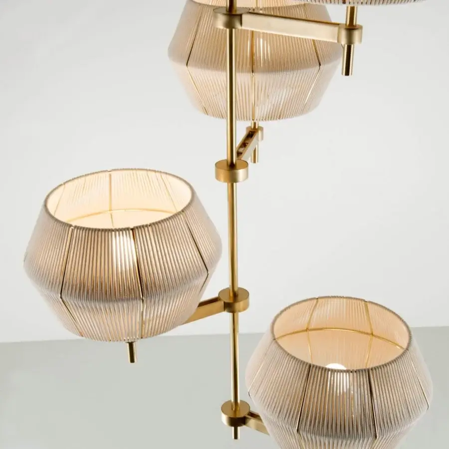 Exceptional Patrizia Garganti Novecento suspension lamp crafted in brass with satin sheen and translucent textured glass