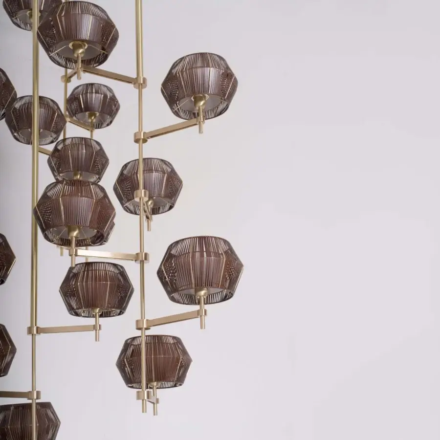 Exceptional Patrizia Garganti Novecento EX01 chandelier crafted with twenty-four light sources in sculptural brown eco leather and satin brass-toned metal