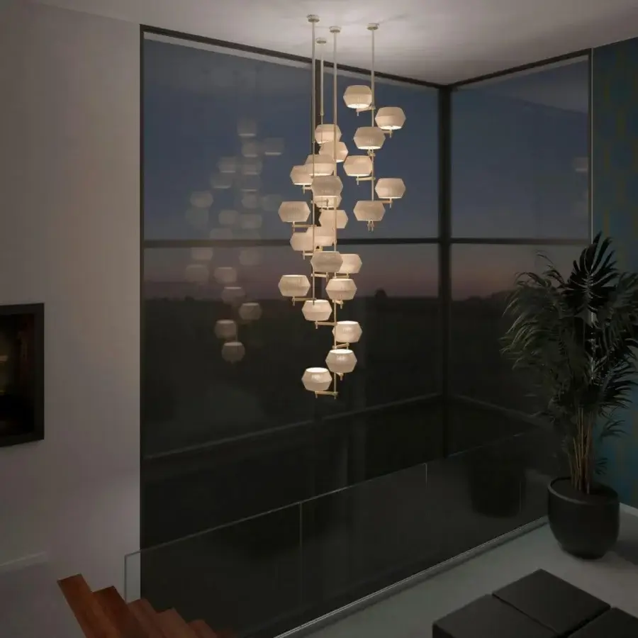 Exceptional Patrizia Garganti Novecento EX01 chandelier crafted from metal and clear glass with a warm gold finish