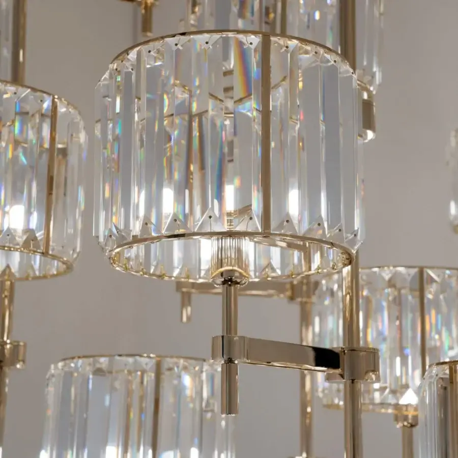 Superior Patrizia Garganti Novecento EX04 chandelier crafted in polished gold-tone metal with clear cut crystal modules