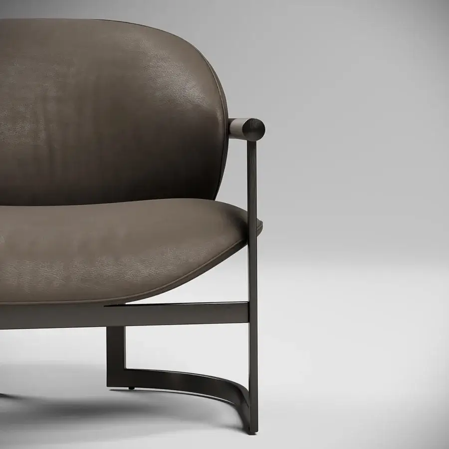 Elegant Capital Flora lounge chair in brownish-grey polyurethane composite with a galvanic aluminum structure and integrated tubular leather armrest