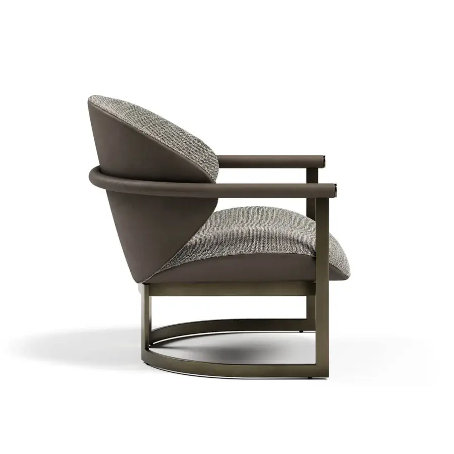 Distinguished Capital Flora lounge chair with soft gray textile upholstery, tubular leather armrests and galvanic coated aluminum structure