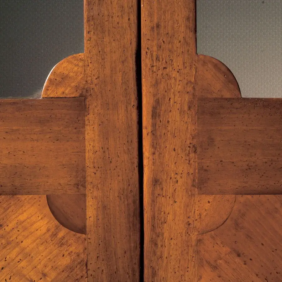 Distinguished Faber Mobili Correggio showcase built with walnut and cherry wood in a warm medium-toned brown finish
