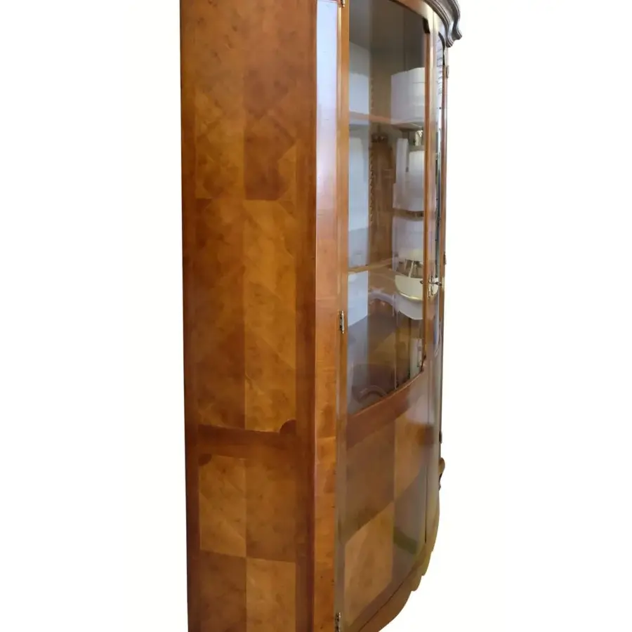 Elegant Faber Mobili Correggio showcase with walnut and cherry wood construction in antiqued brass finish and dynamic herringbone pattern