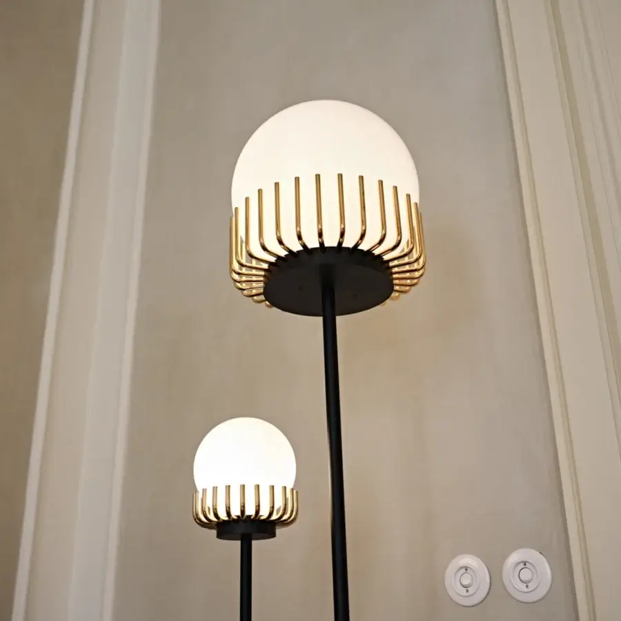 Captivating Black Tie Lucy floor lamp with luminous spheres built in matte black and radiant golden accents