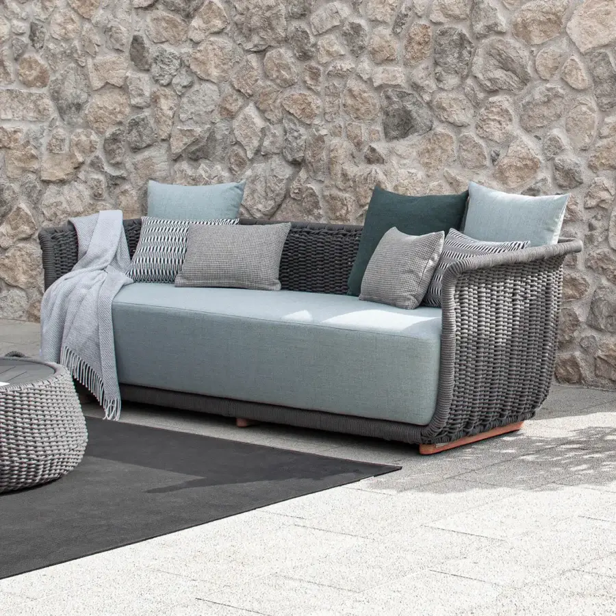 Distinguished Atmosphera Bellagio sofa with a hand-woven melange-coloured acrylic yarn frame and light-toned wooden legs