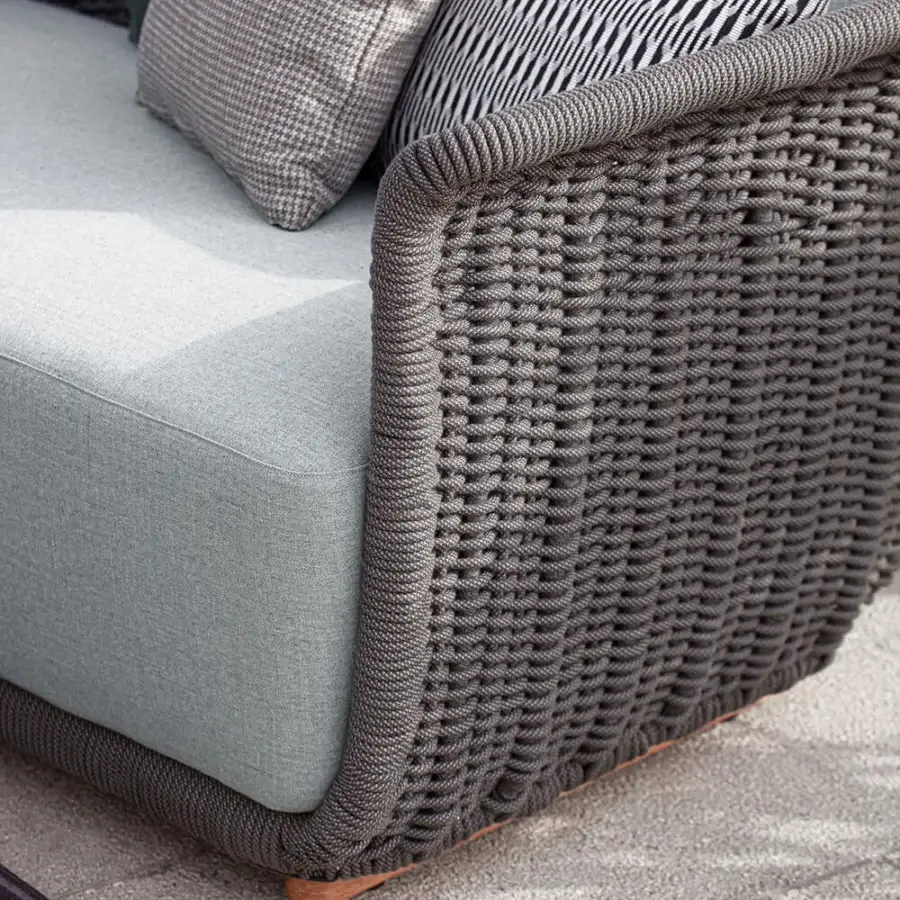Superior Atmosphera Bellagio sofa with a hand-woven medium gray acrylic yarn frame and light-toned wooden base