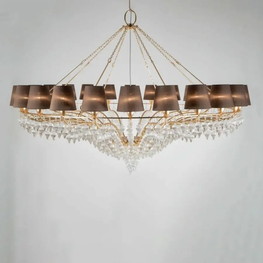 Lavish Patrizia Garganti Ophelia chandelier crafted in Italy with cascading crystal lozenges and warm gold-toned metal frame