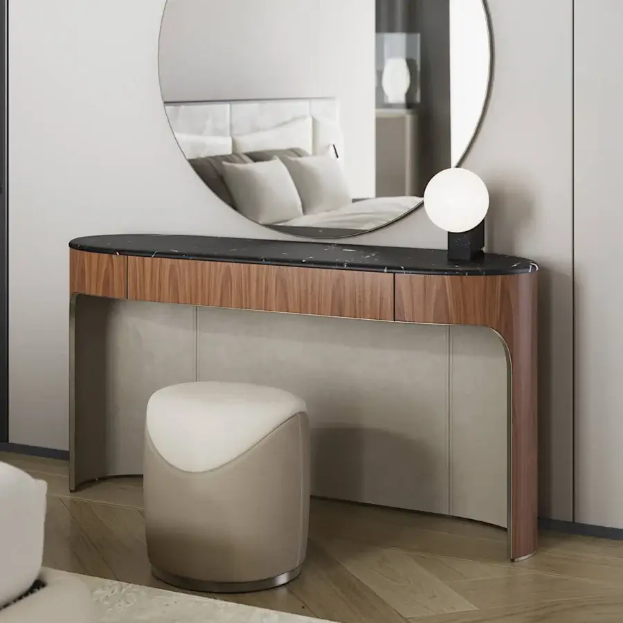 Distinguished Capital Clori vanity with warm brown wood veneer and striking dark marble, showcasing a refined, curved silhouette