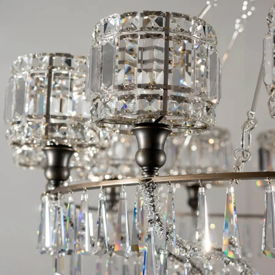 Exceptional Patrizia Garganti Ophelia chandelier crafted in clear crystal with dark-toned metal, showcasing lozenge lampshades and cascading prisms
