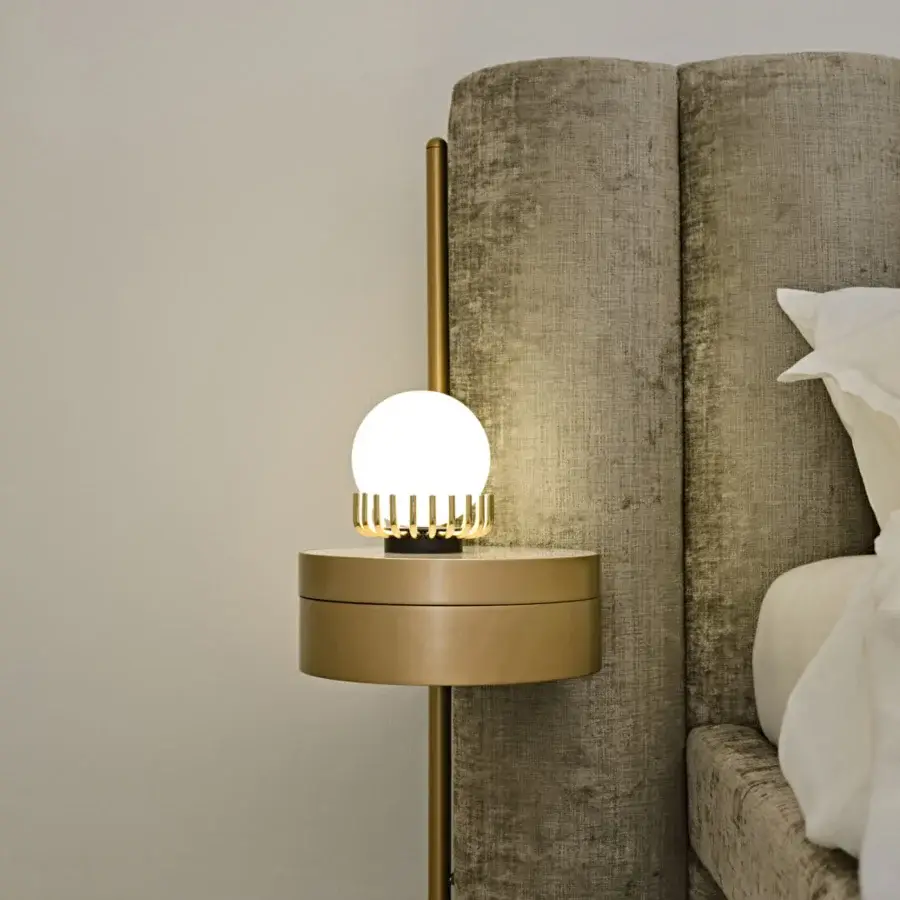 Distinguished Black Tie Lucy table lamp with metal and glossy opal glass in a muted gold finish