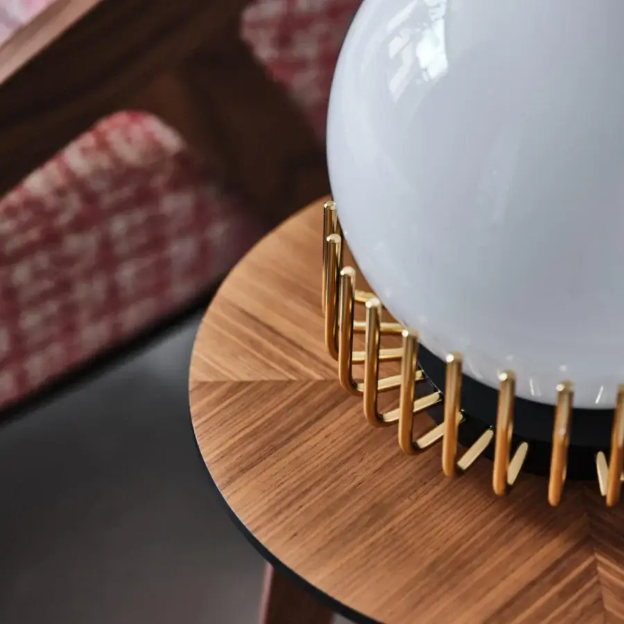 Superior Black Tie Lucy table lamp with opalescent glass and warm brown wood base accented with golden metal spikes