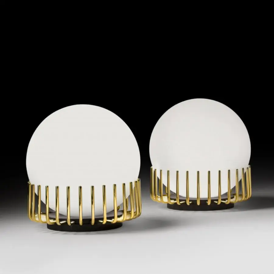 Captivating Black Tie Lucy table lamp with glossy opal glass and slender gold-finished metal structure