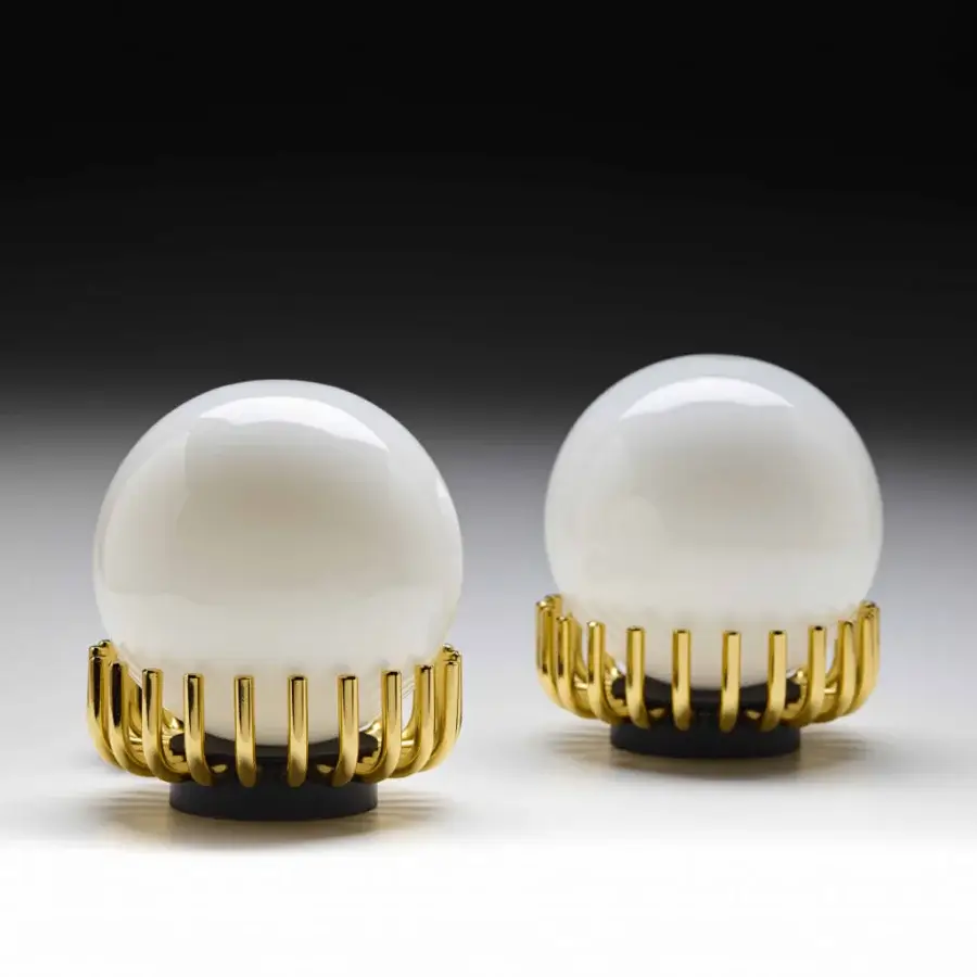 Distinguished Black Tie Lucy table lamp with opalescent glass and dark metal built with golden accents