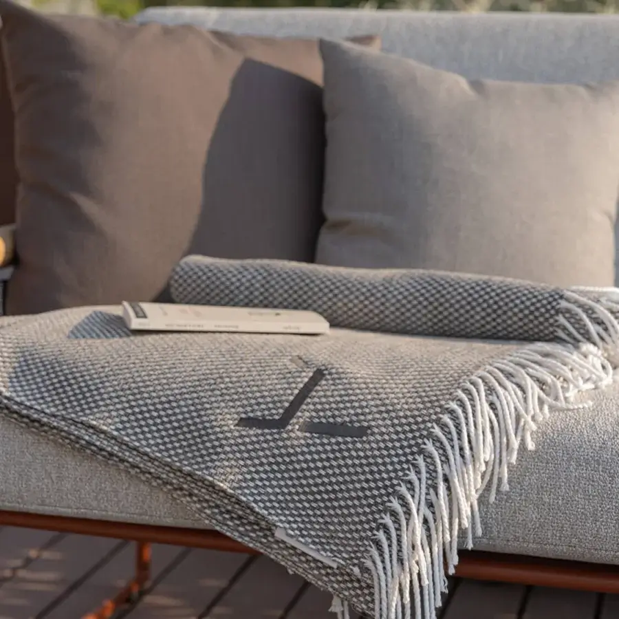 Exceptional Atmosphera Pipe sofa with terracotta epoxy-coated steel frame and hand-woven neutral gray acrylic cord backrest