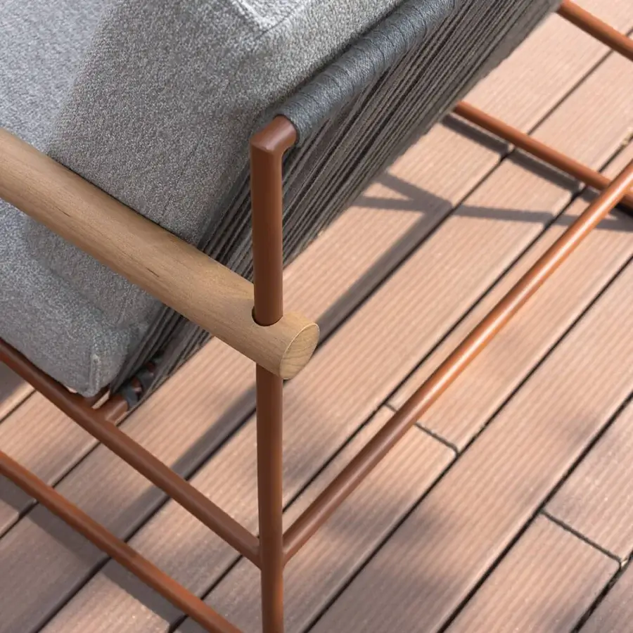 Distinguished Atmosphera Pipe lounge chair with terracotta epoxy-coated steel, teak armrests and hand-woven acrylic cord backrest