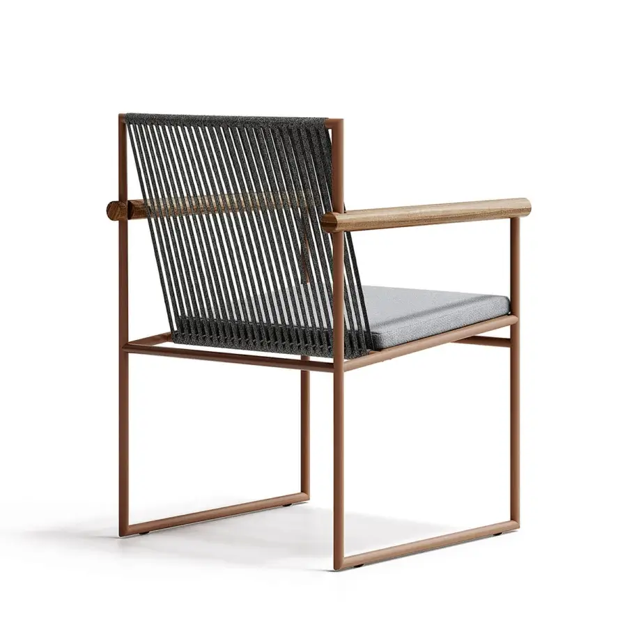 Sophisticated Atmosphera Pipe armchair with terracotta epoxy-coated steel, dark gray acrylic cords and teak armrests