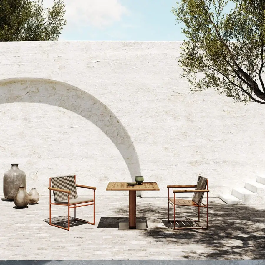 Exceptional Atmosphera Pipe armchair crafted with terracotta epoxy-coated steel, hand-woven beige acrylic cords and teak armrests