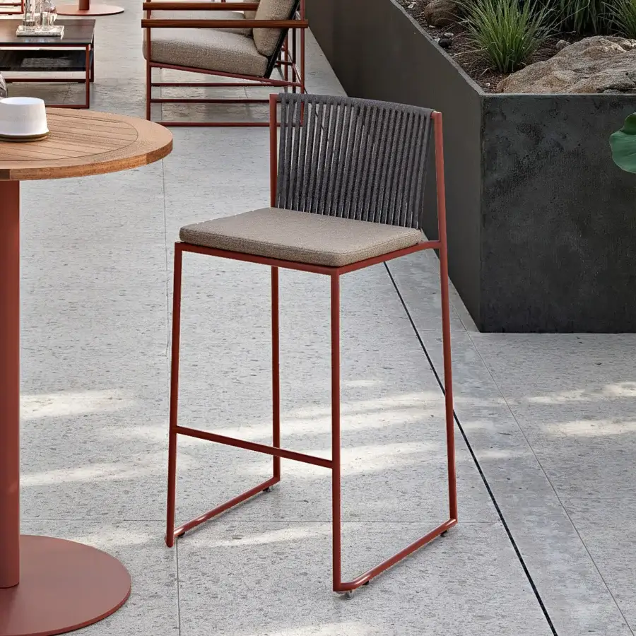 Distinguished Atmosphera Pipe stool with terracotta epoxy powder-coated steel, hand-woven acrylic rope backrest and bold geometry