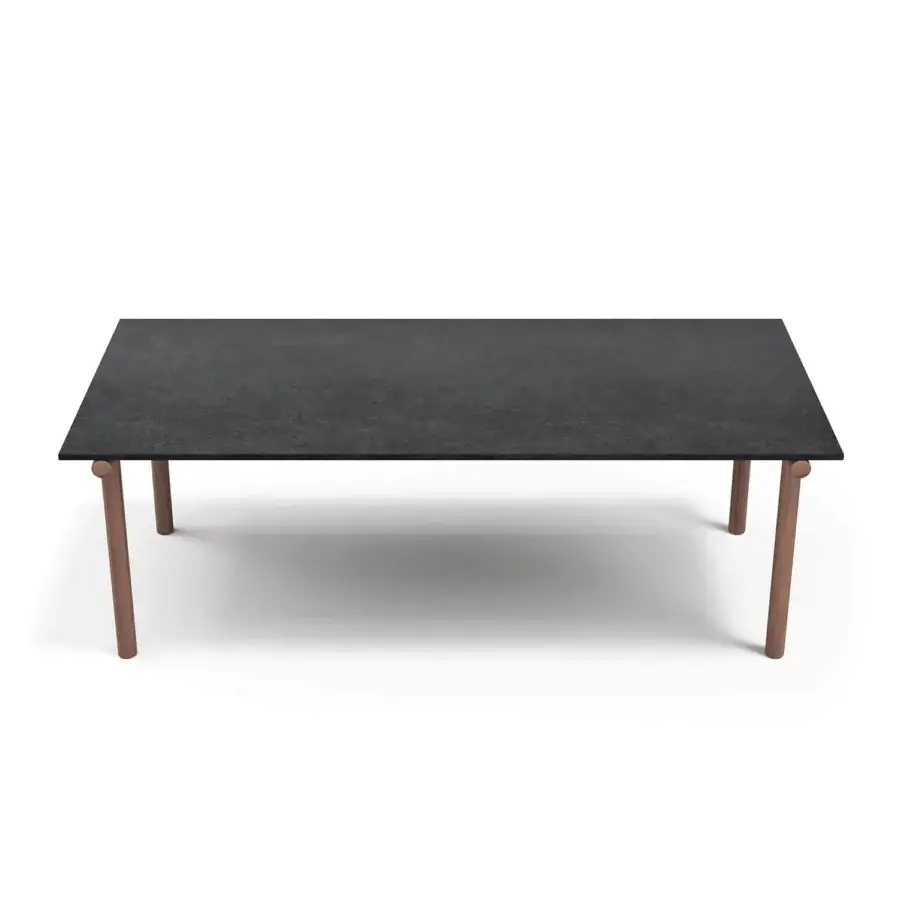 Elegant Atmosphera Pipe table with a textured black gres top and solid Asian teak legs
