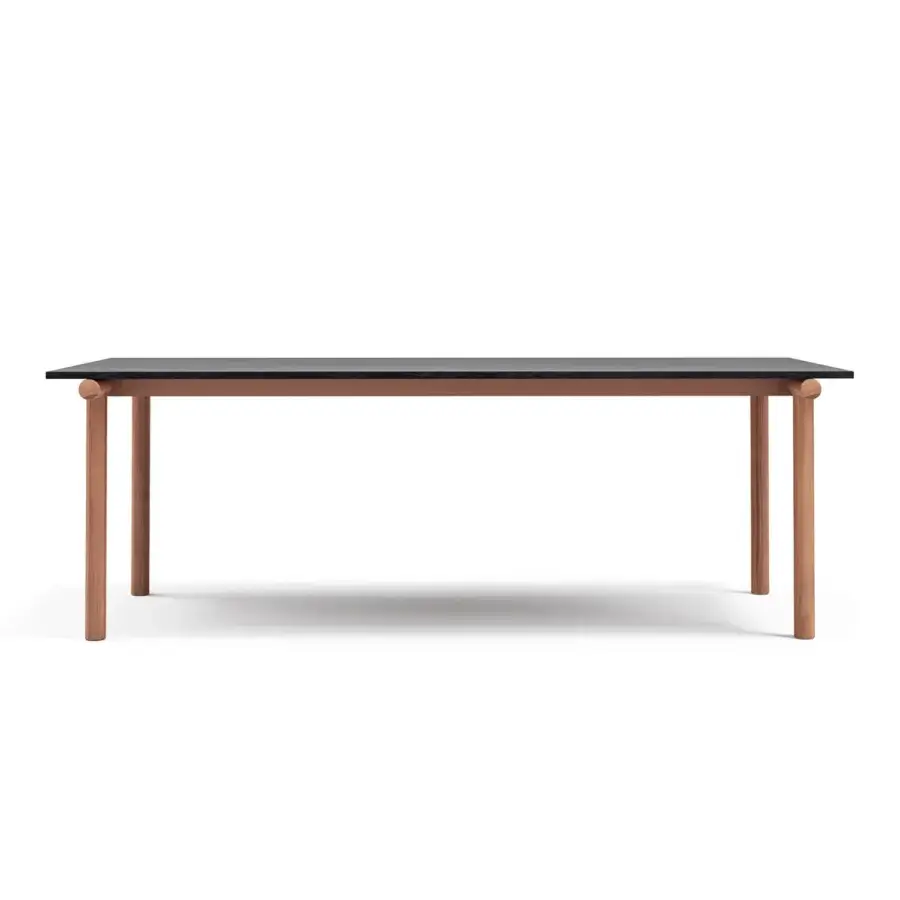 Distinguished Atmosphera Pipe table with a matte gres top and solid Asian teak legs exhibiting contrasting dark and reddish-brown tones