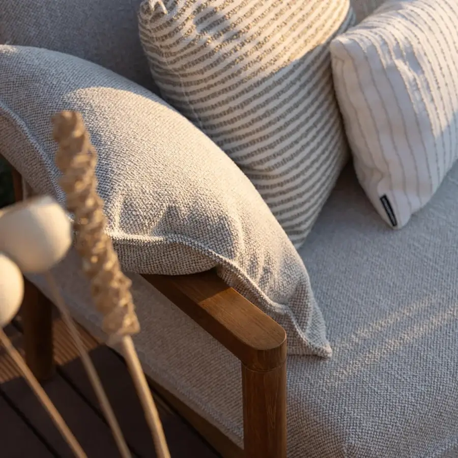 Exceptional Atmosphera Panama sofa with substantial solid teak frame and inviting heathered gray high-performance upholstery with satin finish