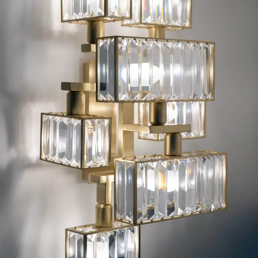 Distinguished Patrizia Garganti Tur wall lamp crafted in polished golden metal with clear faceted crystal elements