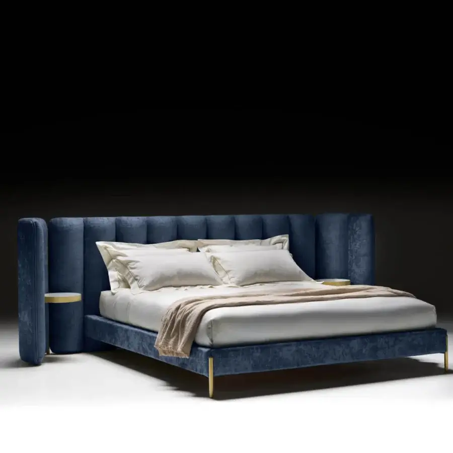Distinguished Black Tie Ibisco bed with sculpted headboard crafted from poplar wood upholstered in textured blue velvet with metallic accents