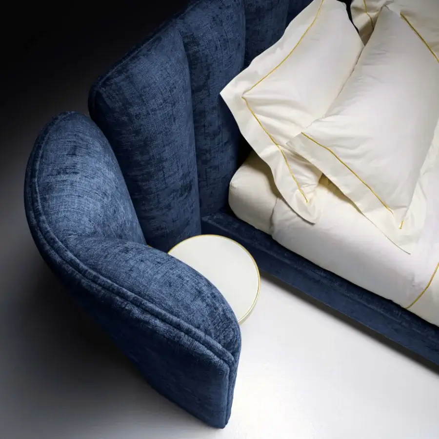 Exceptional Black Tie Ibisco bed upholstered in deep blue textured textile with a matte finish and built with a poplar wood frame