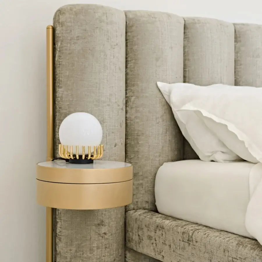 Lavish Black Tie Ibisco bed with sculpted headboard crafted from poplar wood and upholstered in muted beige textile with matte finish