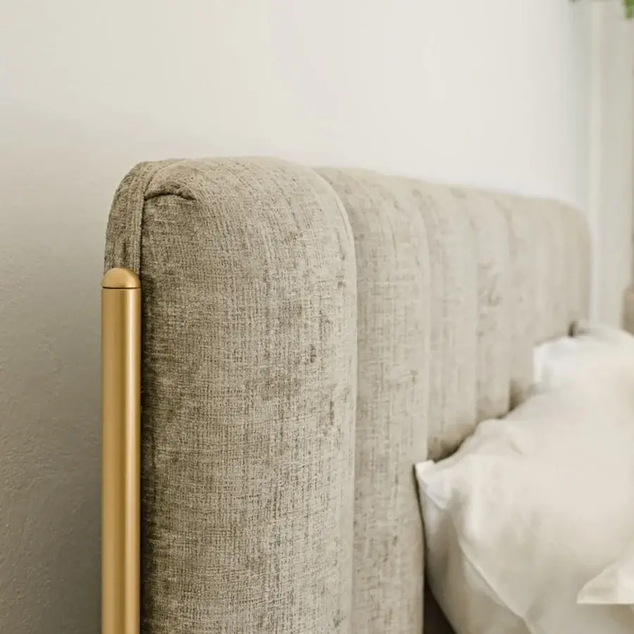 Distinguished Black Tie Ibisco bed with padded headboard crafted from poplar wood and neutral beige textile with polished golden metal supports