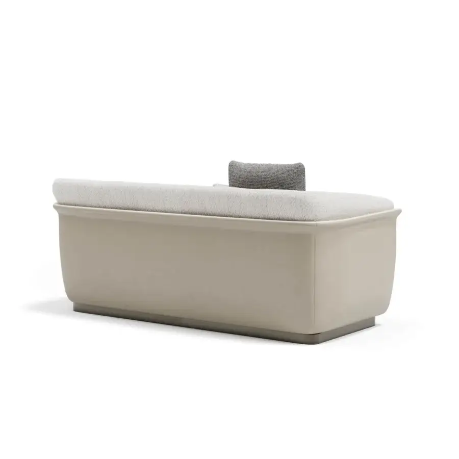 Exclusive Capital Allure sofa with low wide form and plush memory foam pre-cover in textured muted beige textile with matte synthetic base