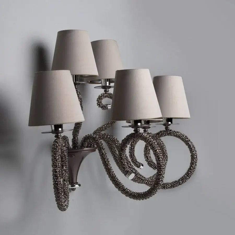 Captivating Patrizia Garganti 1180 wall lamp with delicate metalwork and four neutral conical lampshades in dark gray-silver with polished silver accents