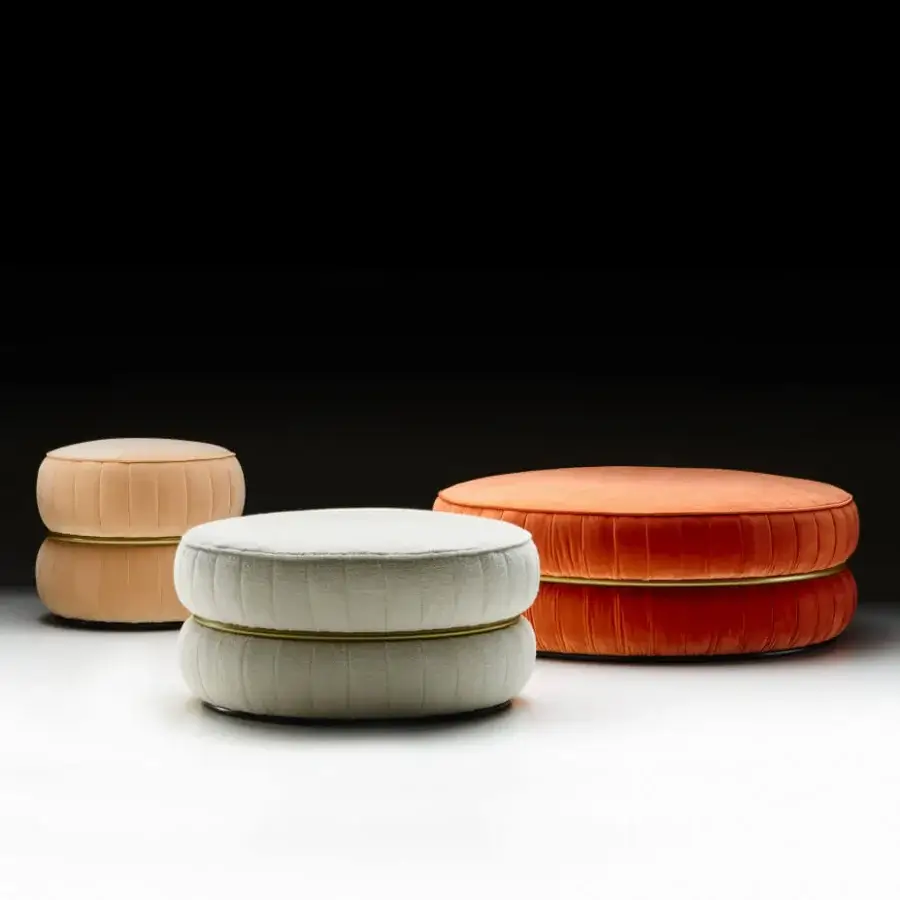Superior Black Tie Lillo ottoman with vibrant orange textile upholstery, refined ribbed stitching and a slender metal ring