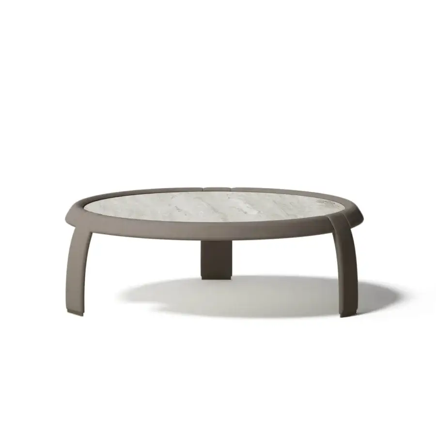 Elegant Capital Omega coffee table with marble tabletop exhibiting gray and white veining in a muted taupe leather frame with metallic details