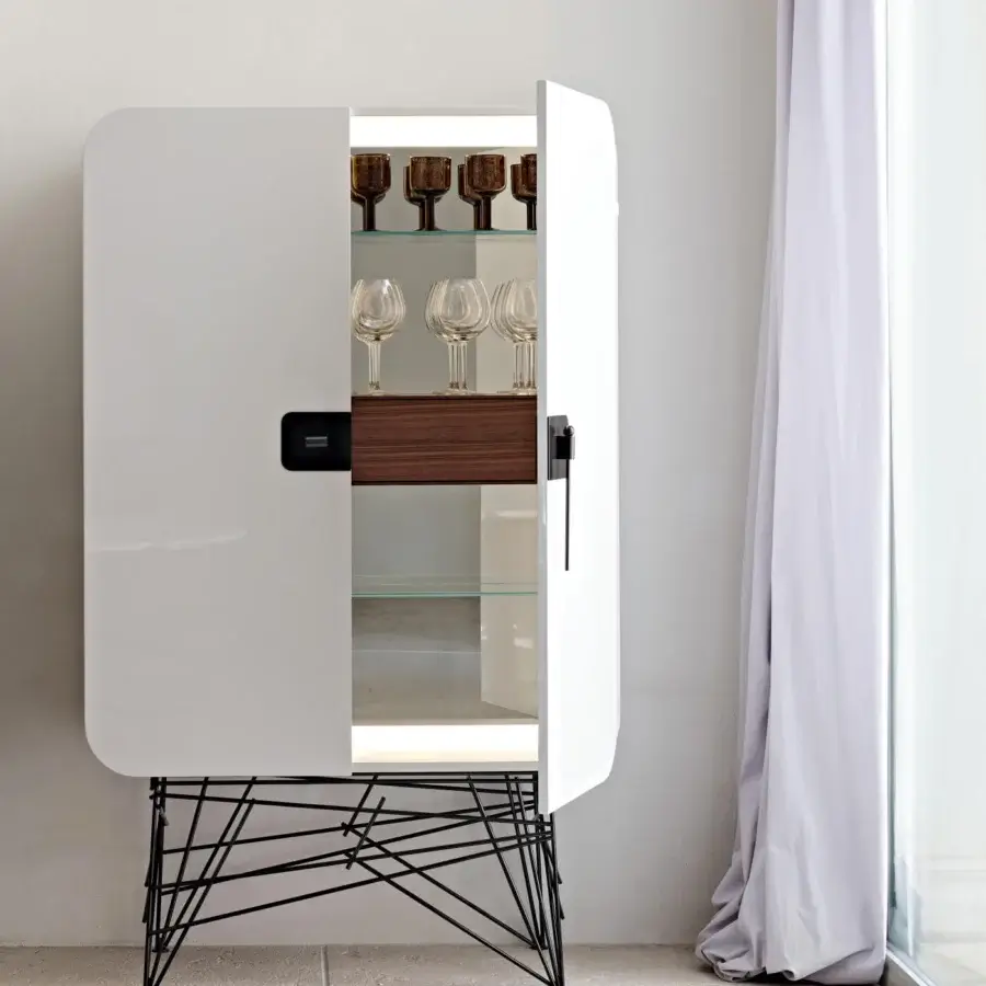 Superior Black Tie Mai Tai Cupboard crafted with curved plywood, lacquered MDF panels, a stainless steel base, and a bright white finish