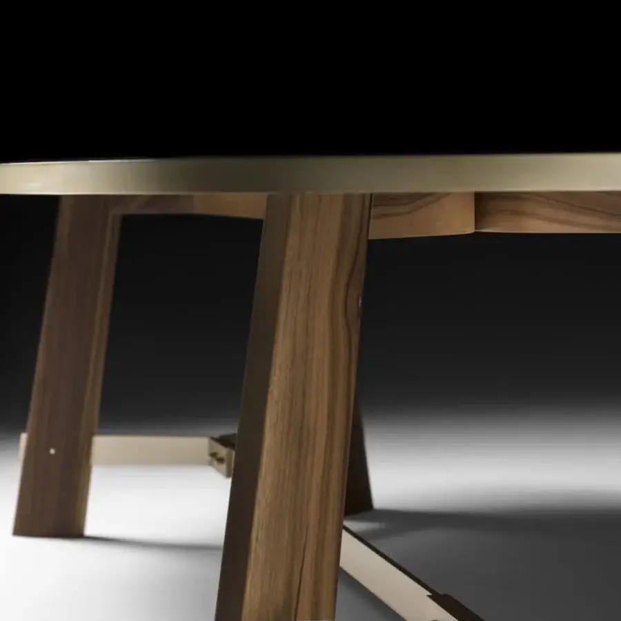 Distinguished Black Tie Opera table with smooth glass and richly grained wood legs plus polished gold metal accents