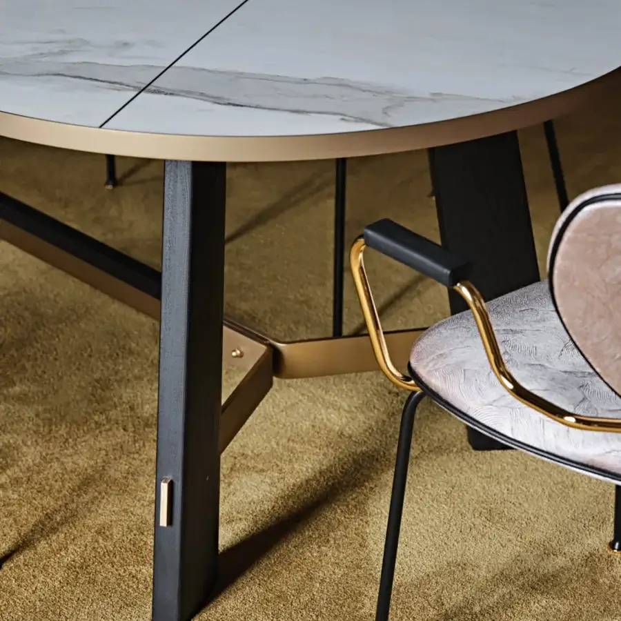 Superior Black Tie Opera table with white marble tabletop and angled black wood with brass-toned metal base exhibiting a polished glossy finish