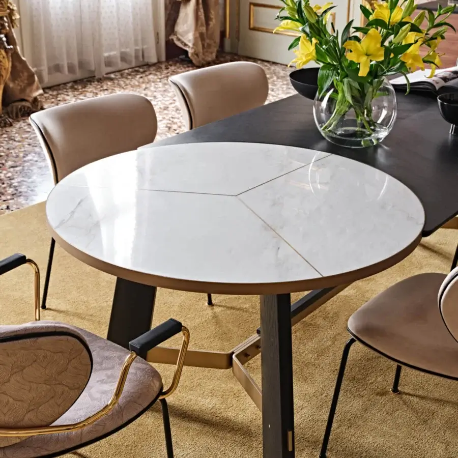 Lavish Black Tie Opera table with white marble tabletop and dark angled base crafted in gold-finished metal