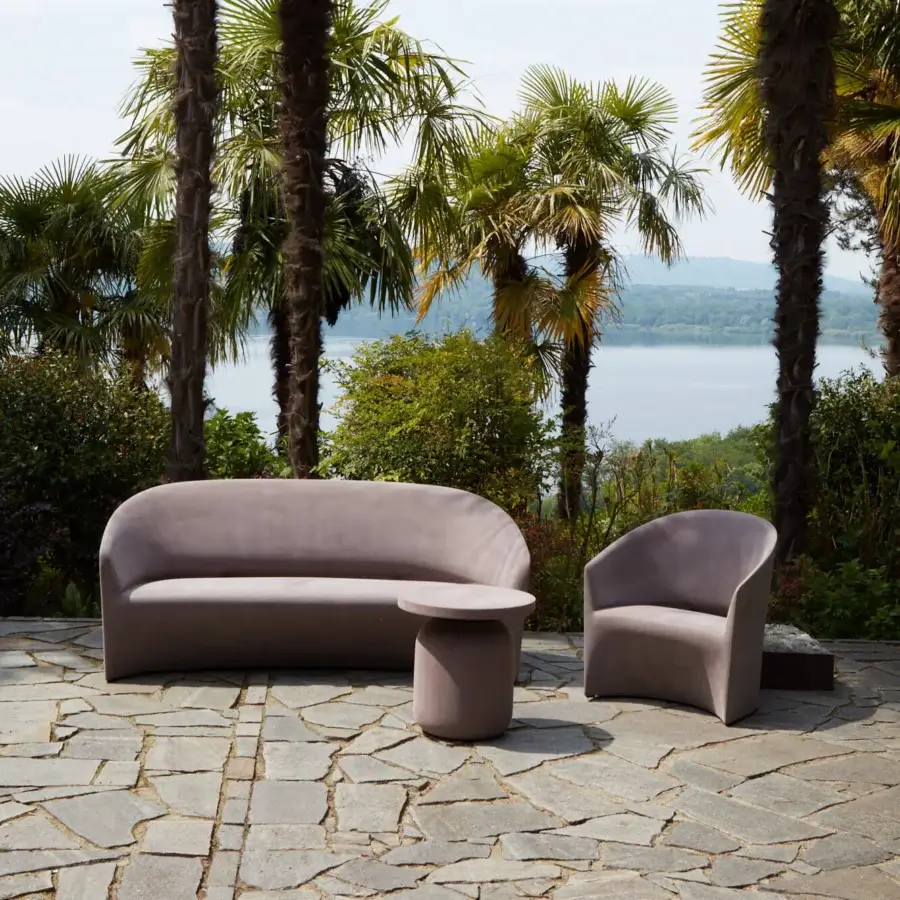 Distinguished Serralunga Pine Beach lounge chair with fluid form and matte dusty rose LLDPE construction