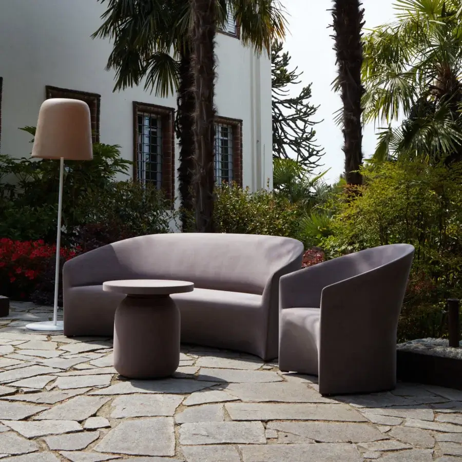 Exceptional Serralunga Pine Beach lounge chair with enveloping design in pale mauve recyclable LLDPE and matte finish