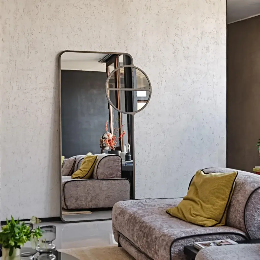 Superior Black Tie Mou mirror crafted with dark bronze metal and tonal variations in glass for a refined presence
