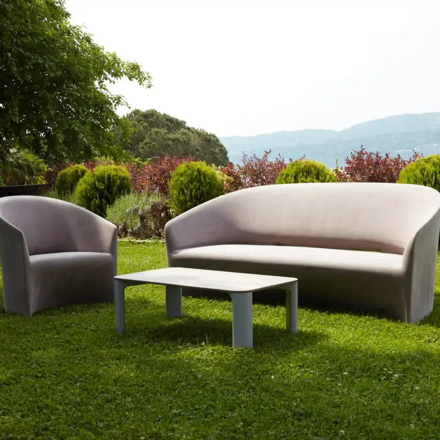 Exceptional Serralunga Pine Beach sofa crafted in dusty rose recyclable LLDPE with a fluid sculpted form for indoor outdoor use