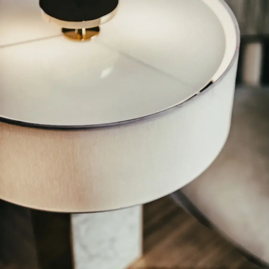 Distinguished Black Tie Thelma table lamp with white Carrara marble and matte black metal built in a cylindrical form