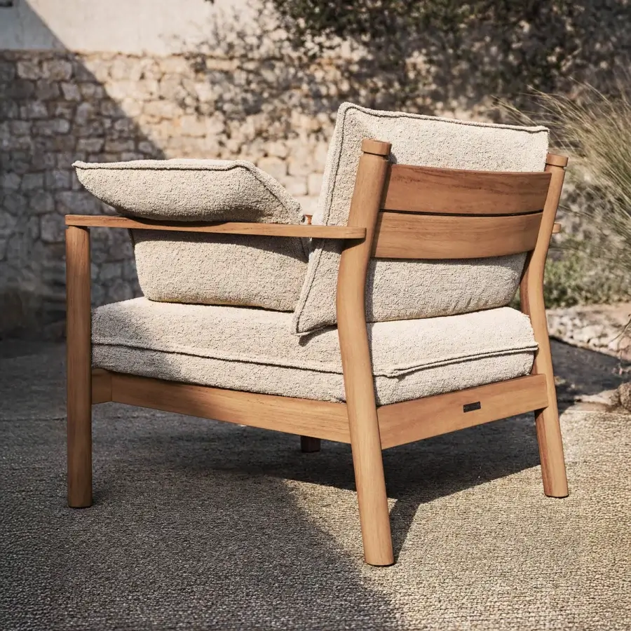Superior Atmosphera Panama lounge chair crafted with cylindrical teak frame and neutral beige textured cushions with satin finish